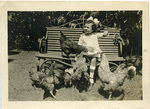 Roberta Church feeding chickens, Memphis, Tennessee, August 2, 1918