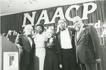 Dr. Benjamin Hooks on stage with others at the 1984 NAACP Annual Convention by Rex Purefoy