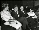 Mrs. James Roosevelt, John F. Kennedy, James Roosevelt, and Mrs. Vel Philips at Senatorial Address by Harry Adams