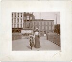 Woman and child on Front Street, Memphis, circa 1900