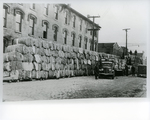 Cotton bales lining Exchange Street, Memphis, Tennessee, 1937
