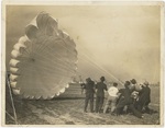 Men with a parachute, undated