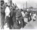 Memphis sanitation workers enter Memphis City Hall, 1968