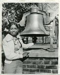 Virginia Smith standing beside the Founders Bell at LeMoyne-Owen College, Memphis, Tennessee, 1975