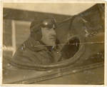 Vernon Omlie in the cockpit of an aircraft, undated