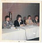 Beatles attending press conference at Mid-South Coliseum