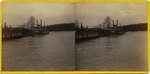 Moored steamboat and barges, circa 1880