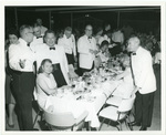 Alfred L. Whitman at a social function