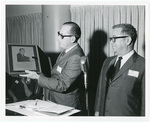 Image of Alfred L. Whitman receiving an award