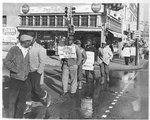Striking sanitation workers picketing on Beale Street, Memphis, 1968