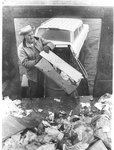 Memphian unloads garbage during the sanitation workers' strike, 1968