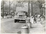 Collecting garbage during sanitation workers strike, Memphis, 1968 by Jim Shearin