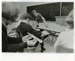 Memphis State University class working with slide rules, 1960s